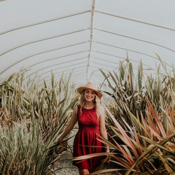 Kaveri Mehta, Lead Design Curator at Quarry Fathom Quiver, reviewing corporate floral arrangements